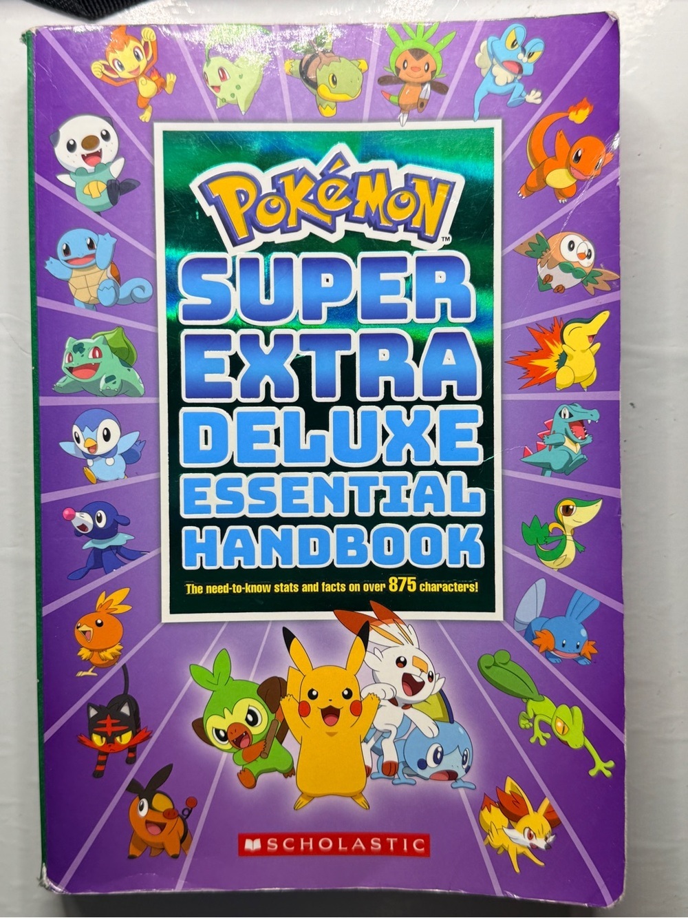Pokémon Super Extra Deluxe Essential Handbook Scholastic 2021